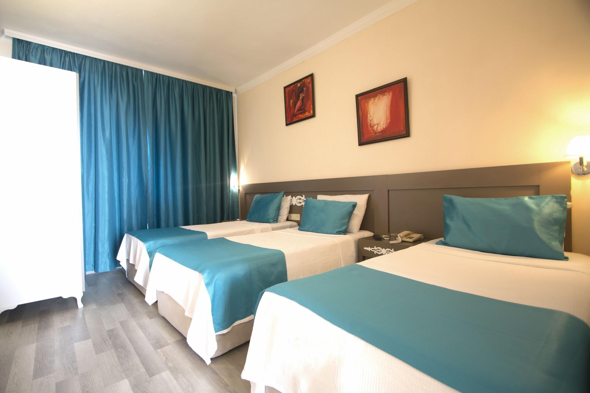 Sky Vela Hotel & Suites Гюмбет Екстериор снимка